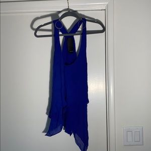 Subtly cobalt blue shirt & gold earrings